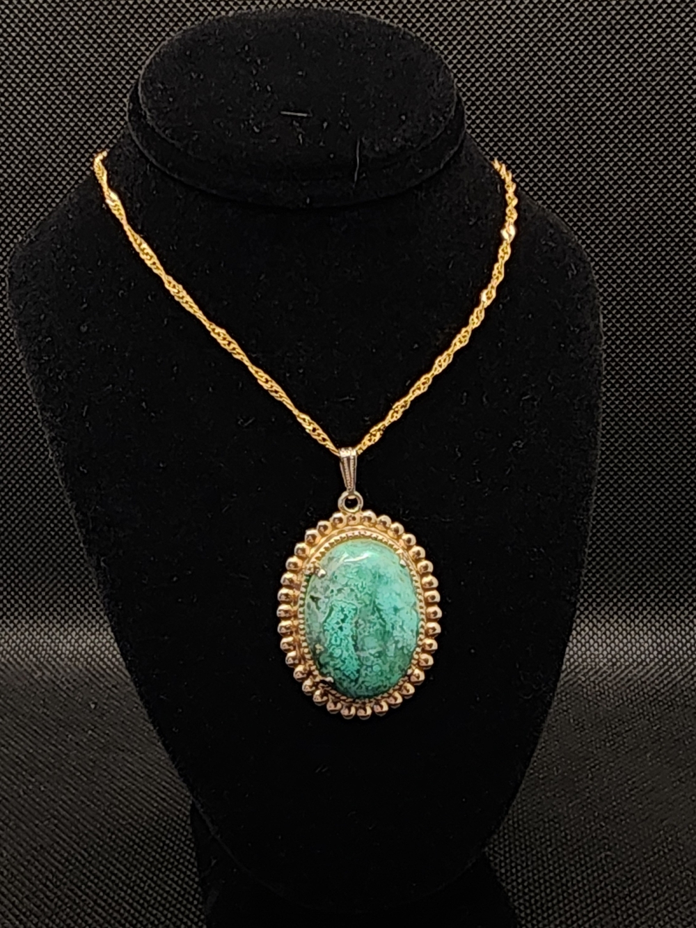 Vintage hand mounted stone (by Lottie) on gold plated chain